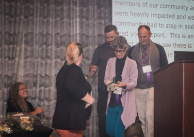 MeAD accepting their award.