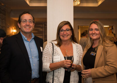 Three attendees at the DRM celebration.